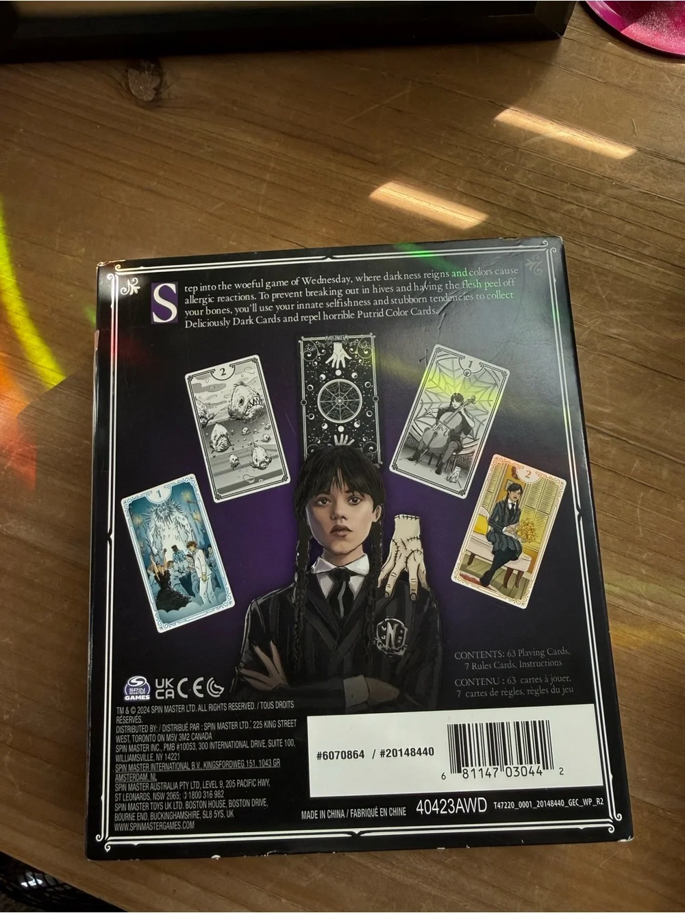 New Wednesday The Card Game - Black Box with Colorful Stained Glass Artwork